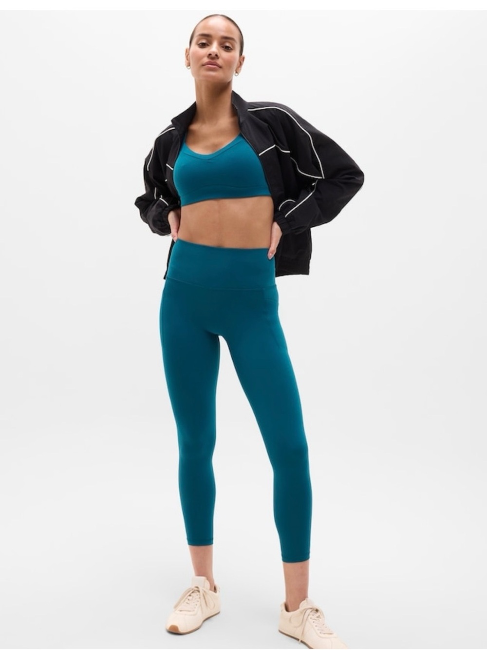Athleta Mid Rise Salutation Stash Pocket II 7/8 Tight Leggings in Teal, medium